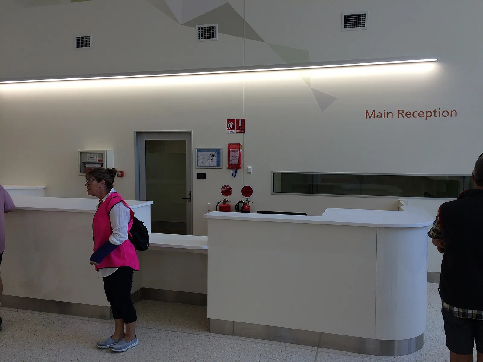 Hospital main reception desk in an entrance lobby