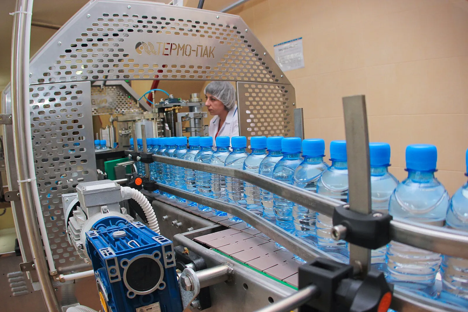 Bottled water moving along an automated production line